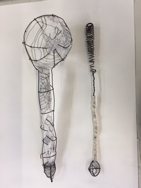 Wire scoop given solidity using a tissue mono print